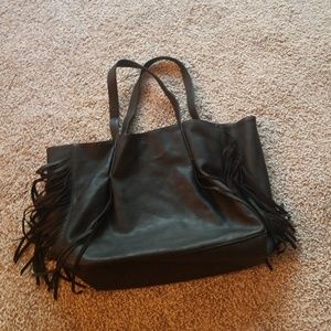 Black purse with tassels